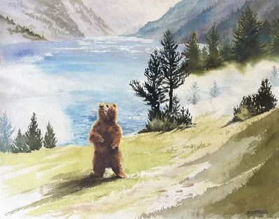 L'ours devant le lac de montagne